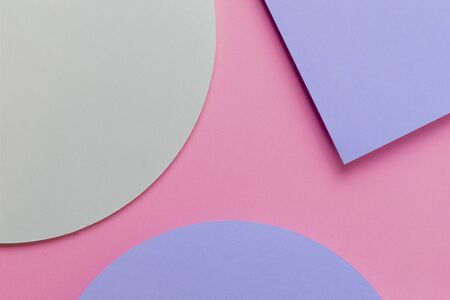 Abstract colored paper texture background. Minimal geometric shapes with shadows, circles and lines in pastel pink, light blue and green colours.の写真素材