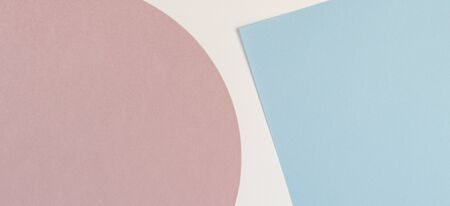 Abstract colored paper texture background. Minimal geometric shapes and lines in pastel pink, light blue, white colorsの写真素材