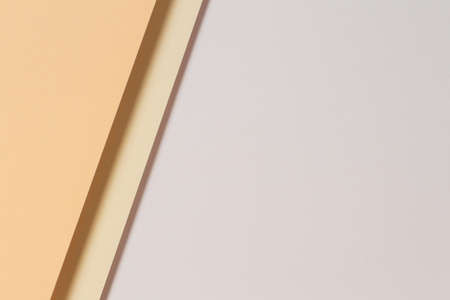 Abstract color papers geometry flat lay composition background with light brown, beige color tonesの写真素材