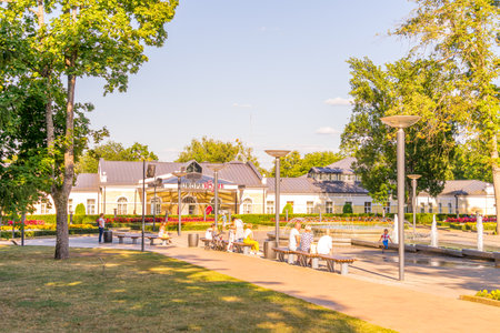Druskininkai, Lithuania - August 13, 2020: People relax near fountain in the central park of Druskininkaiのeditorial素材