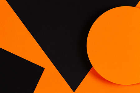 Abstract geometry paper texture background. Shape and lines in black and orange colors. Top viewの写真素材