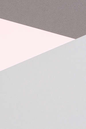 Abstract colored paper texture background. Minimal geometric shapes and lines in pastel pink and light gray coloursの写真素材