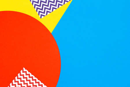 Abstract geometric fashion papers texture background in yellow,red, blue colors. Top view, flat layの写真素材