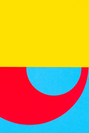 Abstract geometric fashion papers texture background in yellow, red, light blue colors. Top view, flat layの写真素材
