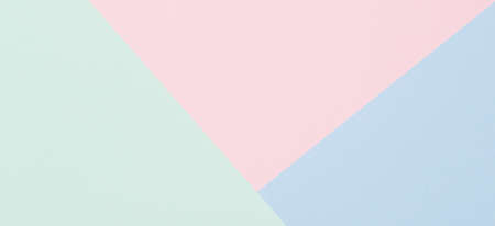 Abstract colored paper texture background. Minimal geometric shapes and lines in light blue, pastel pink, green colorsの写真素材