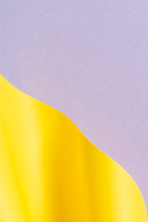 Abstract creative geometric curved shape yellow and light gray color paper background
