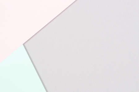 Abstract colored paper background. Minimal geometric shapes and lines in pastel pink, light green...