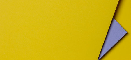 Abstract colored paper texture banner background. Minimal geometric shapes and lines in yellow and gray colorsの写真素材