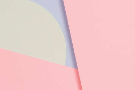 Abstract colored paper texture background. Minimal geometric shapes and lines in light blue, pastel pink, green colorsの写真素材