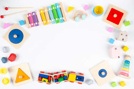Sustainable zero waste colorful educational and musical toys for baby kids on white background. Top...