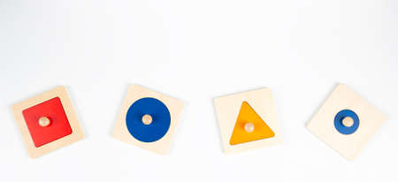 Colorful wooden Montessori sensorial material learning educational toys on white background....