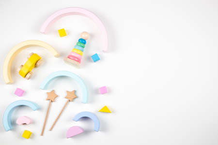 Colorful sustainable zero waste educational toys for baby kids on white background. Top view, flat...