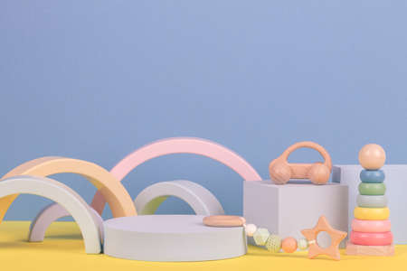 Babby kid toy background. Composition of colorful educational toys and geometric shapes podium,...