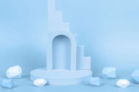 Abstract background trendy composition with geometric shapes forms. Exhibition podium, platform for product presentation on pastel blue backgroundの写真素材