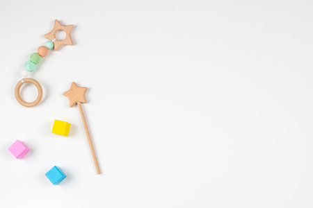 Baby kids toys frame on white background. Top view. Flat lay. Copy space for text