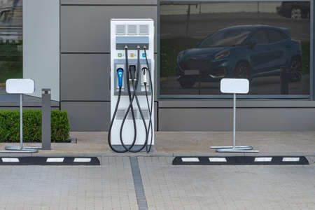 Public charging station for electric cars in a parking lot