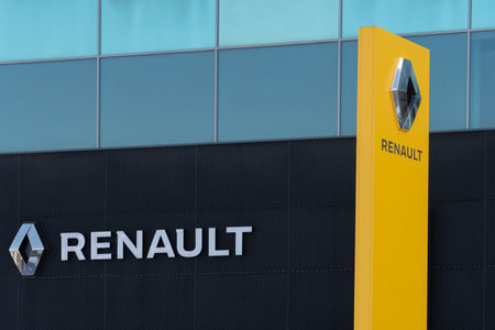 Vilnius, Lithuania - May 12, 2021 Renault logo sign on oficial dealer office showroom building. Renault S.A. is French car manufacturer producing cars, vans, buses, trucks and other vehiclesのeditorial素材