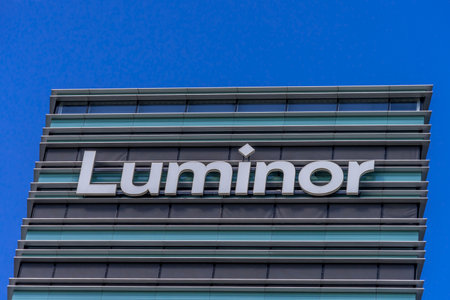 Luminor logo on Luminor head office building on 30 May 2021 in Vilnius, Lithuania. Luminor Bank AS is bank headquartered in Estonia, with branches in Latvia and Lithuaniaのeditorial素材