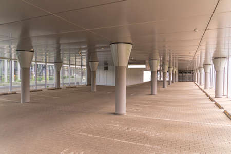 Empty car parking garage in office building