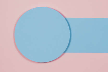 Abstract geometric texture background of pastel pink, light blue color paper. Minimal azure circle and blank line. Top view, copy spaceの写真素材