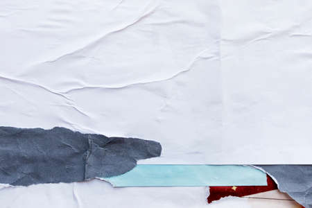 Old white grunge ripped torn collage posters creased crumpled paper placard texture background with...