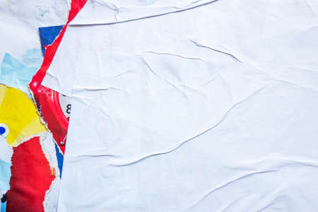 Old white grunge ripped torn collage posters creased crumpled paper placard texture background with...