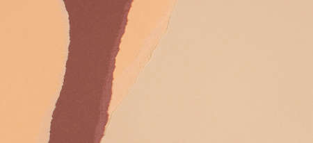 Torn grunge ripped beige brown geometric paper background. Colorful torn paper collage wallpaperの写真素材