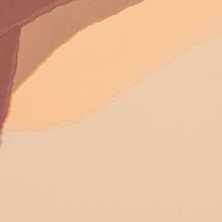 Torn grunge ripped beige brown geometric paper background. Colorful torn paper collage wallpaperの写真素材