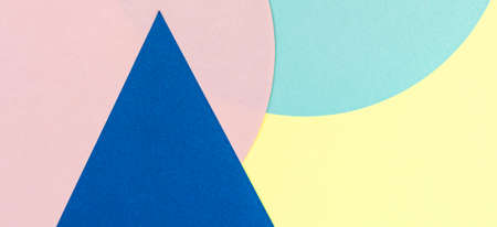 Abstract colored paper texture background. Minimal geometric shapes and lines in pastel pink, blue, yellow and navy colorsの写真素材