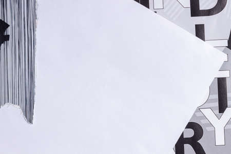 White grunge ripped torn collage posters creased crumpled paper placard texture background with copy...