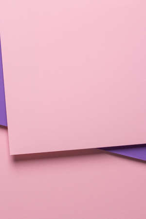 Abstract creative geometric pastel pink and purple violet paper background with copy spaceの写真素材