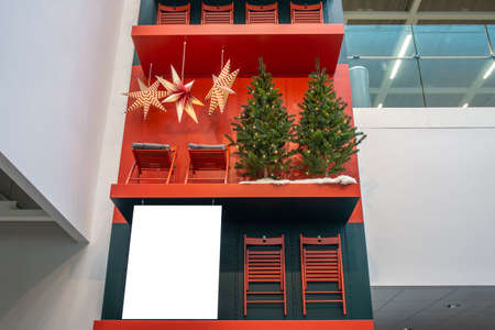 Mock up. Blank white board with christmas decorations inside the store