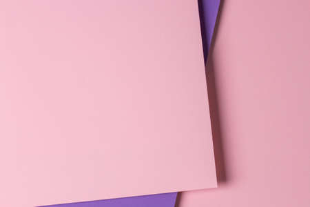 Abstract creative geometric pastel pink and purple violet paper background with copy spaceの写真素材