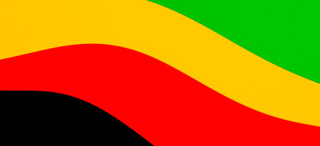 Abstract geometric black, red, yellow, green color background. Black History Month color background with copy space for textの写真素材