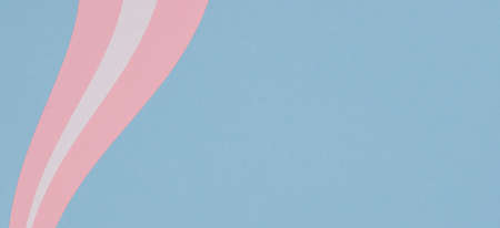 Abstract geometric pastel color paper texture background with curved shapes and line in light blue, pink and white colorsの写真素材