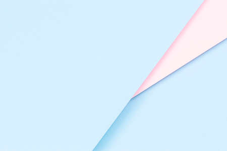 Abstract colored paper texture background. Minimal geometric shapes and lines in light blue and pastel pink colorsの写真素材