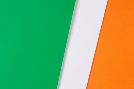 Green, white and orange color paper background with copy space. Abstract geometric composition paperboard with copy spaceの写真素材