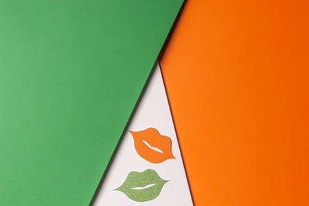Happy St. Patricks day background. Patrick day party props on green white orange background....