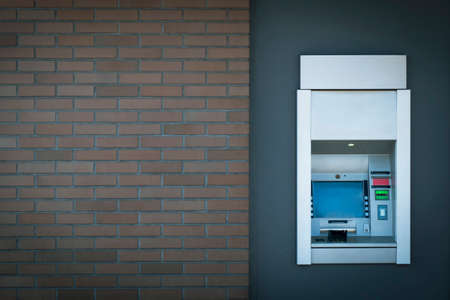 ATM, automated teller machine on the wall. Banking machine, cash point atm near shopping center entranceの写真素材