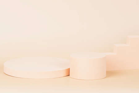 Abstract composition with geometric shapes forms. Exhibition podium, platform on pastel beige background. Front viewの写真素材