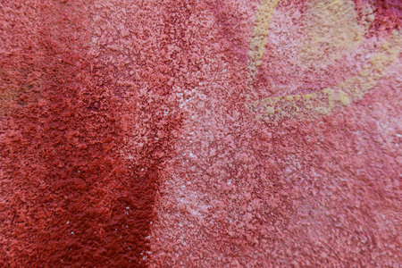 Fragment of the wall with colorful graffiti painting in the street. Part of colorful street art...