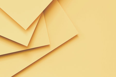 Abstract monochrome creative paper texture background. Minimal geometric pastel yellow color shapes and lines. Top viewの写真素材