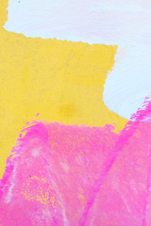 Messy paint strokes and smudges on an old painted wall. Colorful drips, flows, streaks of paint and paint spraysの写真素材