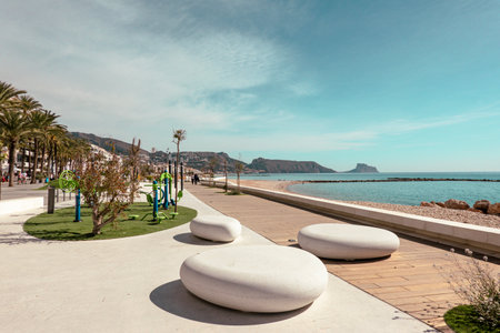 Altea seaside promenade with recreation and active leisure areas on sunny day. Altea - beautiful authentic Spanish village in Alicante Province, Valencian Community, by Mediterranean Sea in Spainの写真素材