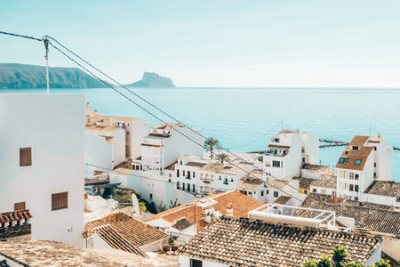 Altea old town with narrow streets and whitewashed houses. Architecture in small picturesque village of Altea near Mediterranean sea in Alicante province, Valencian Community, Spainの写真素材