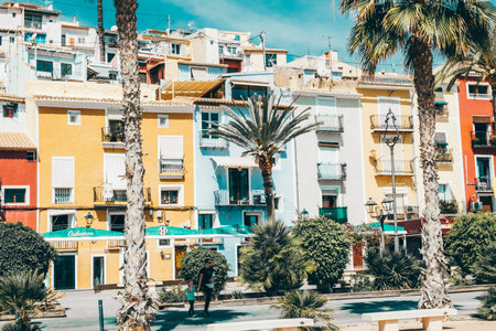 La Vila Joiosa, Spain- March 28, 2023: Beautiful Villajoyosa town with colorful houses. Villajoyosa is small town near Mediterranean Sea in Alicante Province, Valencian Community, Spainのeditorial素材