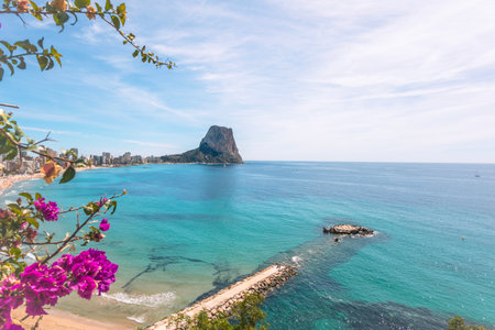 View to seafront in Calpe Mediterranean Sea, famous Rock Penon de Ifach. Calp, Alicante province, Valencian Community, Spainの写真素材
