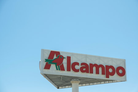 Alicante, Spain- April 12, 2023: Alcampo signboard with logo. Alcampo - popular hypermarket chain in Spainのeditorial素材