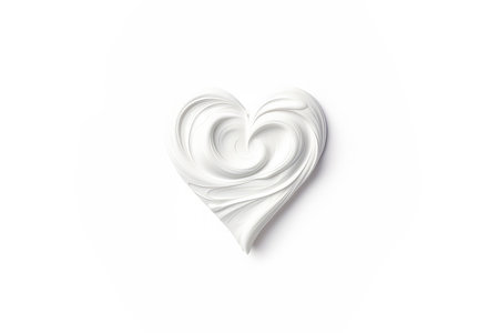 White beauty skincare cream swipe smear in heart shape isolated on white Background. Cosmetics makeup smudge swatches. Top viewの素材