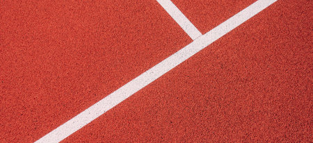 Sports court banner background. Top view to red field rubber ground with white lines outdoors